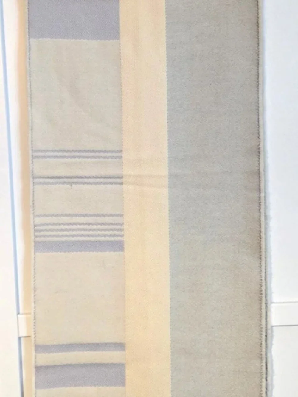 Johnstons of Elgin 100% extrafine merino wool fringed scarf; made in Scotland